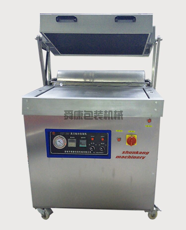 真空貼體包裝機(圖1) 真空貼體包裝機(圖1)