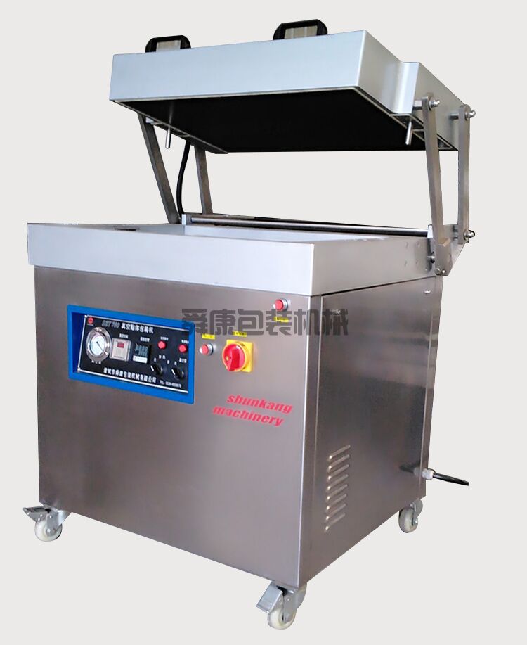 真空貼體包裝機(圖1) 真空貼體包裝機(圖1)